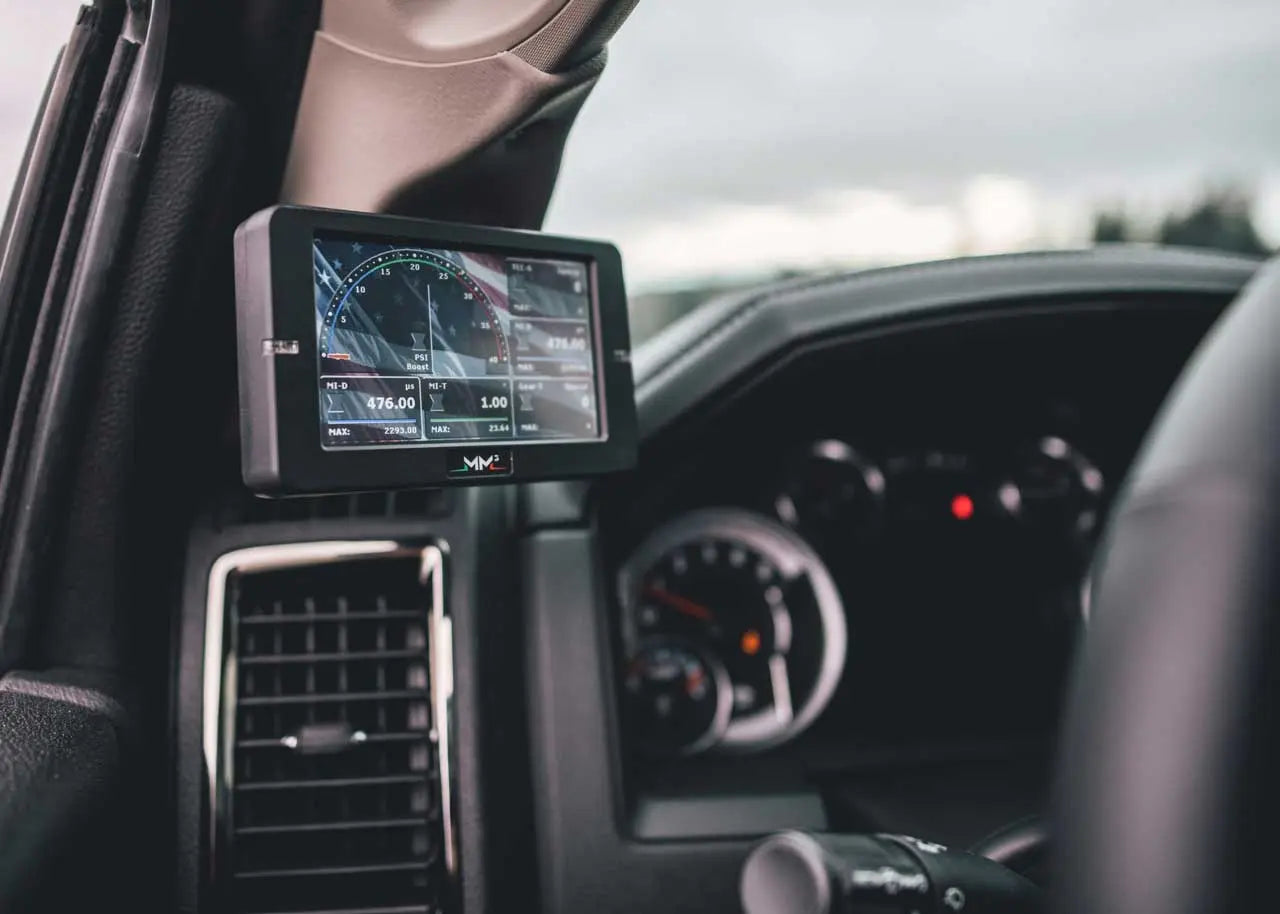 A MM3 Touch Display screen mounted on a GDP Diesel Pickup Truck